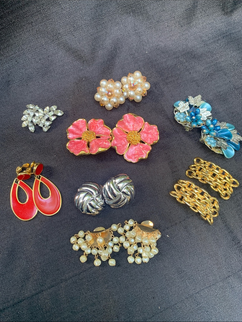 A collection of vintage clip on earrings jewelry lot. Fun assortment of styles